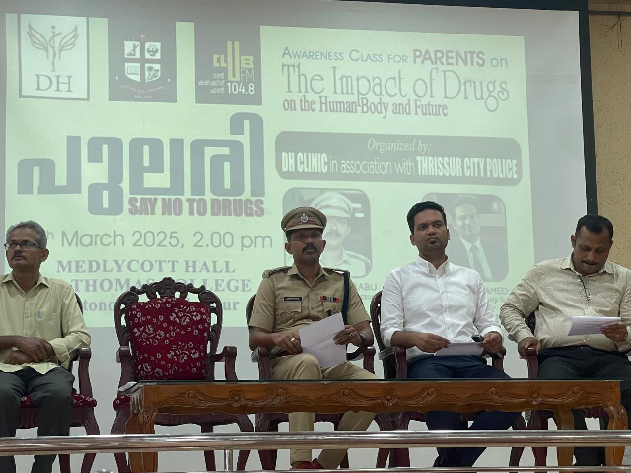 Dr. Althaaf at DH Clinic community awareness event with Thrissur City Police
